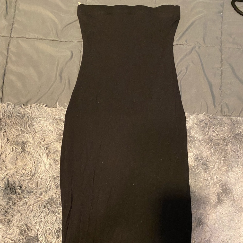 Long black fitted/shape skirt.